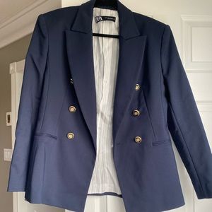 Double breasted navy blazer gold buttons. Fitted